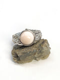 Natural Pink Manganese Ring on Silver-Plated Band gemstone ring, handcrafted jewelry featuring polished stone set in a decorative silver band