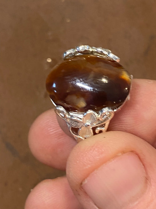 Natural Arizona Fire Agate gemstone jewelry featuring polished stone with distinctive color, pattern, and handcrafted craftsmanship