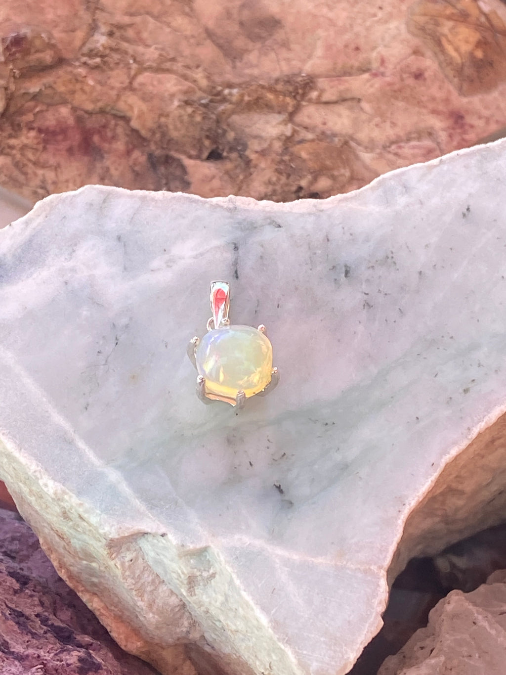 Natural Welo Opal in Sterling Silver Pendant gemstone pendant, handcrafted jewelry featuring polished stone with unique color and mineral patterns