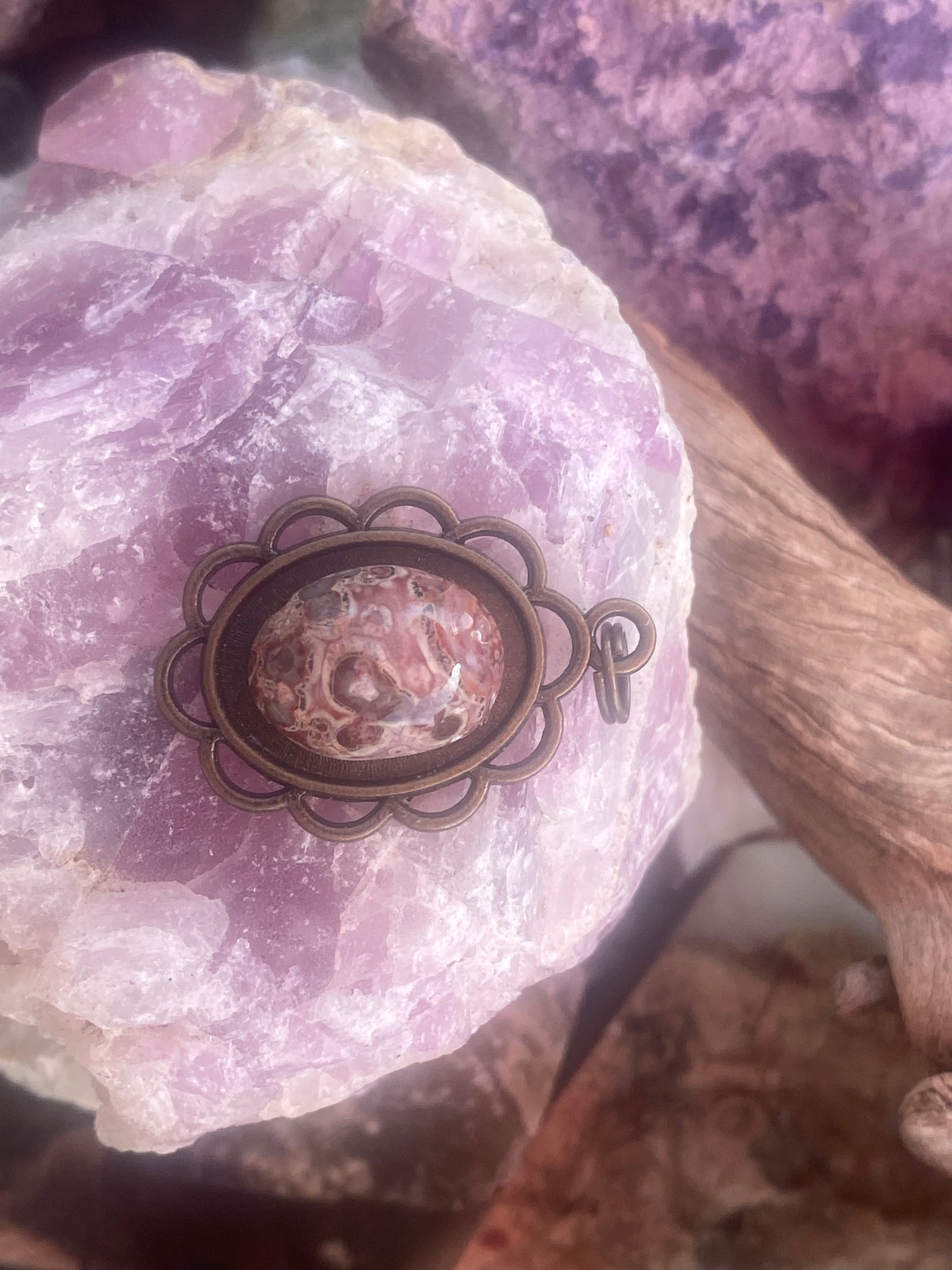 Natural Leopard Skin Jasper Pendant in Ornate Brass Frame gemstone pendant, handcrafted jewelry featuring polished stone with unique color and mineral patterns