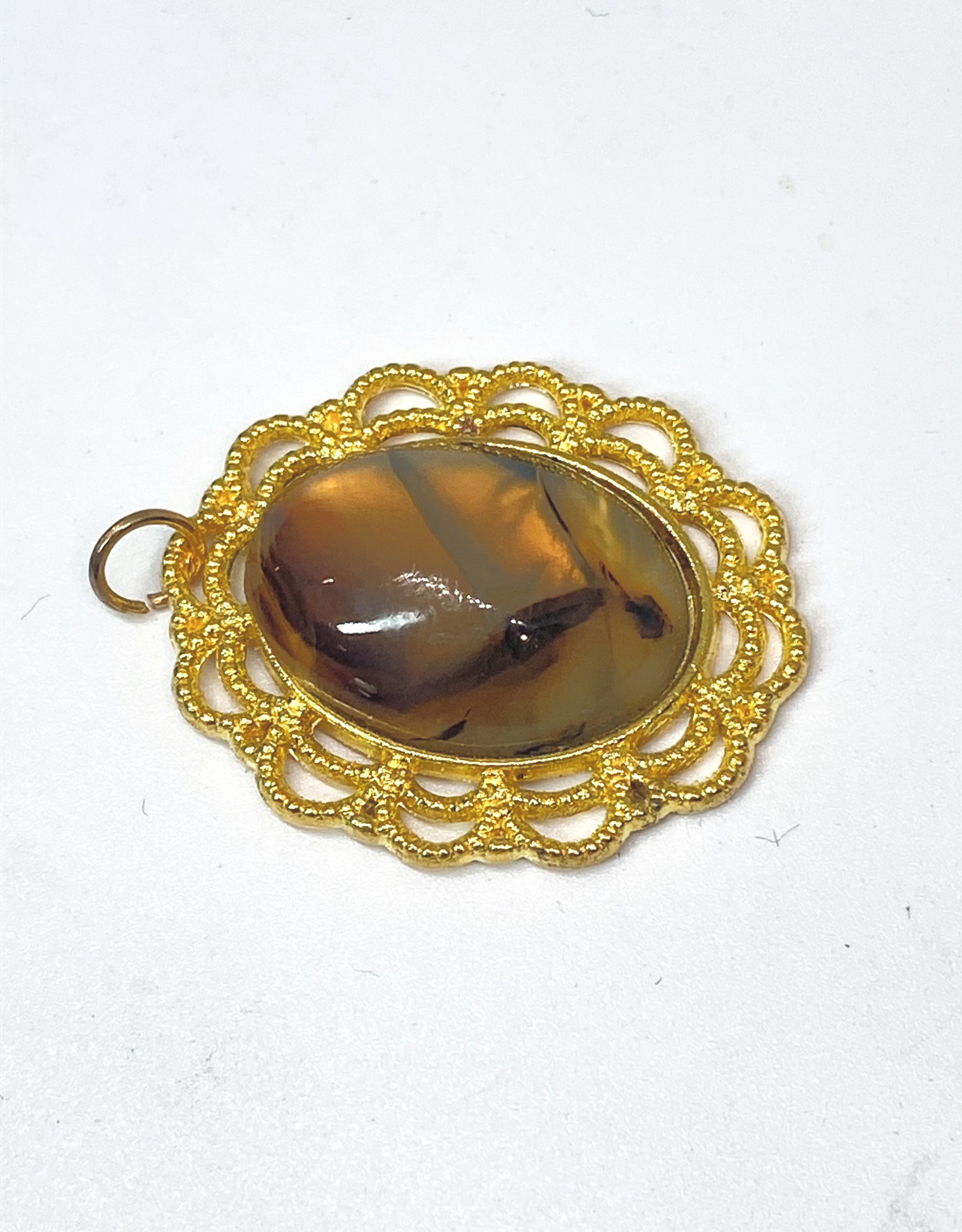 Natural Montana Agate Pendant in Gold-Plated Frame gemstone pendant, handcrafted jewelry featuring polished stone with unique color and mineral patterns