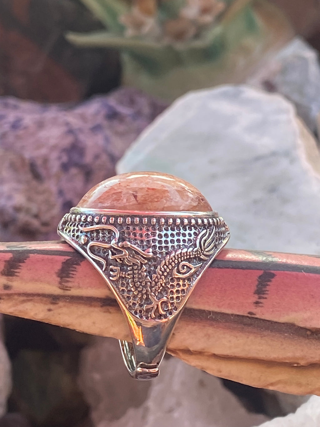 Natural Oregon Sunstone Ring with Intricate Dragon Motif in Sterling Silver gemstone ring, handcrafted jewelry featuring polished stone set in a decorative silver band