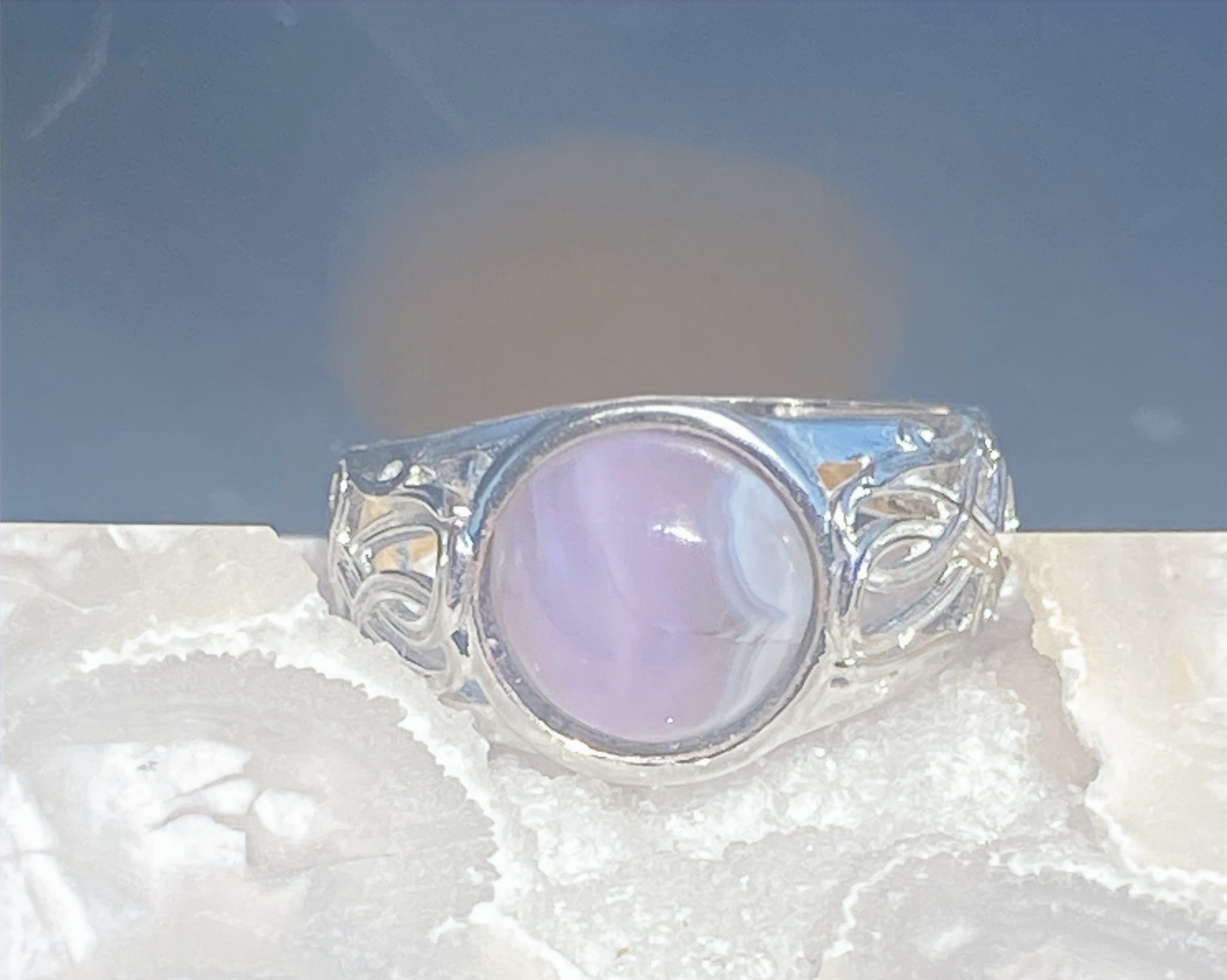 Natural Amethyst Ring on Silver-Plated Band gemstone ring, handcrafted jewelry featuring polished stone set in a decorative silver band