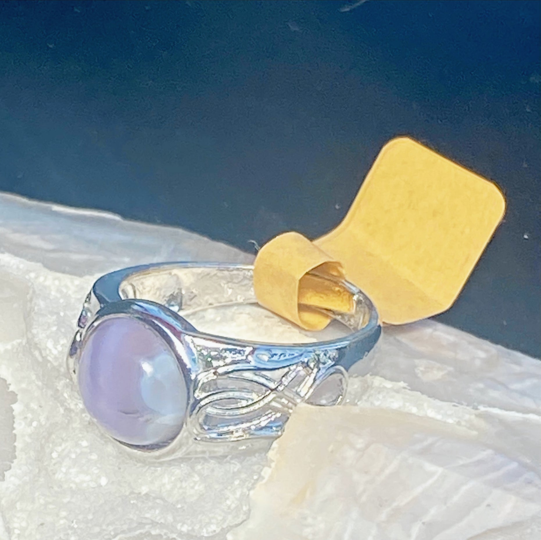Natural Amethyst Ring on Silver-Plated Band gemstone ring, handcrafted jewelry featuring polished stone set in a decorative silver band
