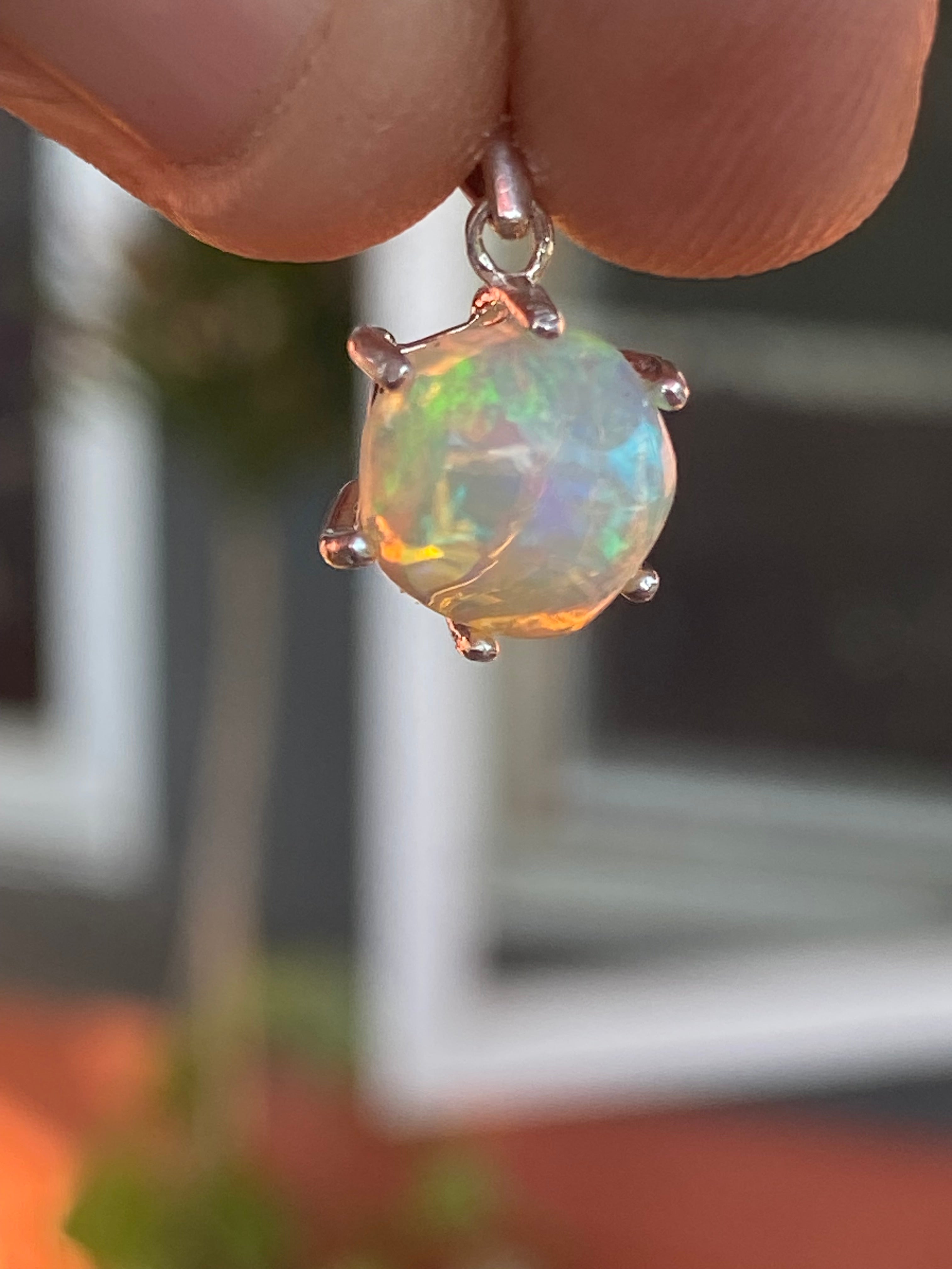 Natural Welo Opal in Sterling Silver Pendant gemstone pendant, handcrafted jewelry featuring polished stone with unique color and mineral patterns