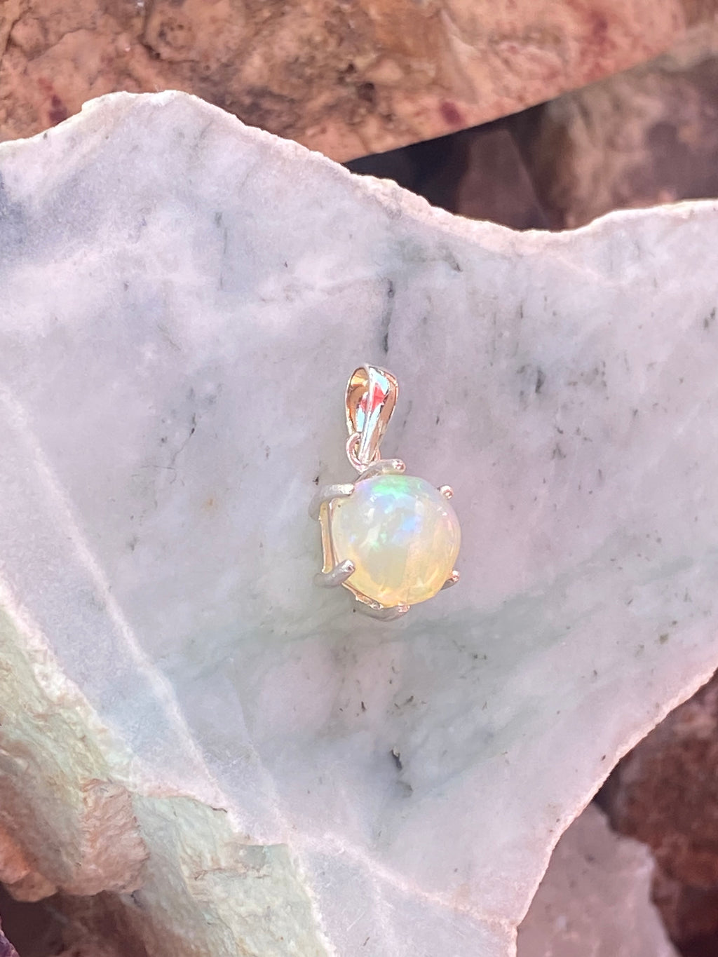 Natural Welo Opal in Sterling Silver Pendant gemstone pendant, handcrafted jewelry featuring polished stone with unique color and mineral patterns