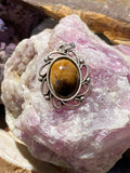 Natural Tiger Eye Pendant gemstone pendant, handcrafted jewelry featuring polished stone with unique color and mineral patterns