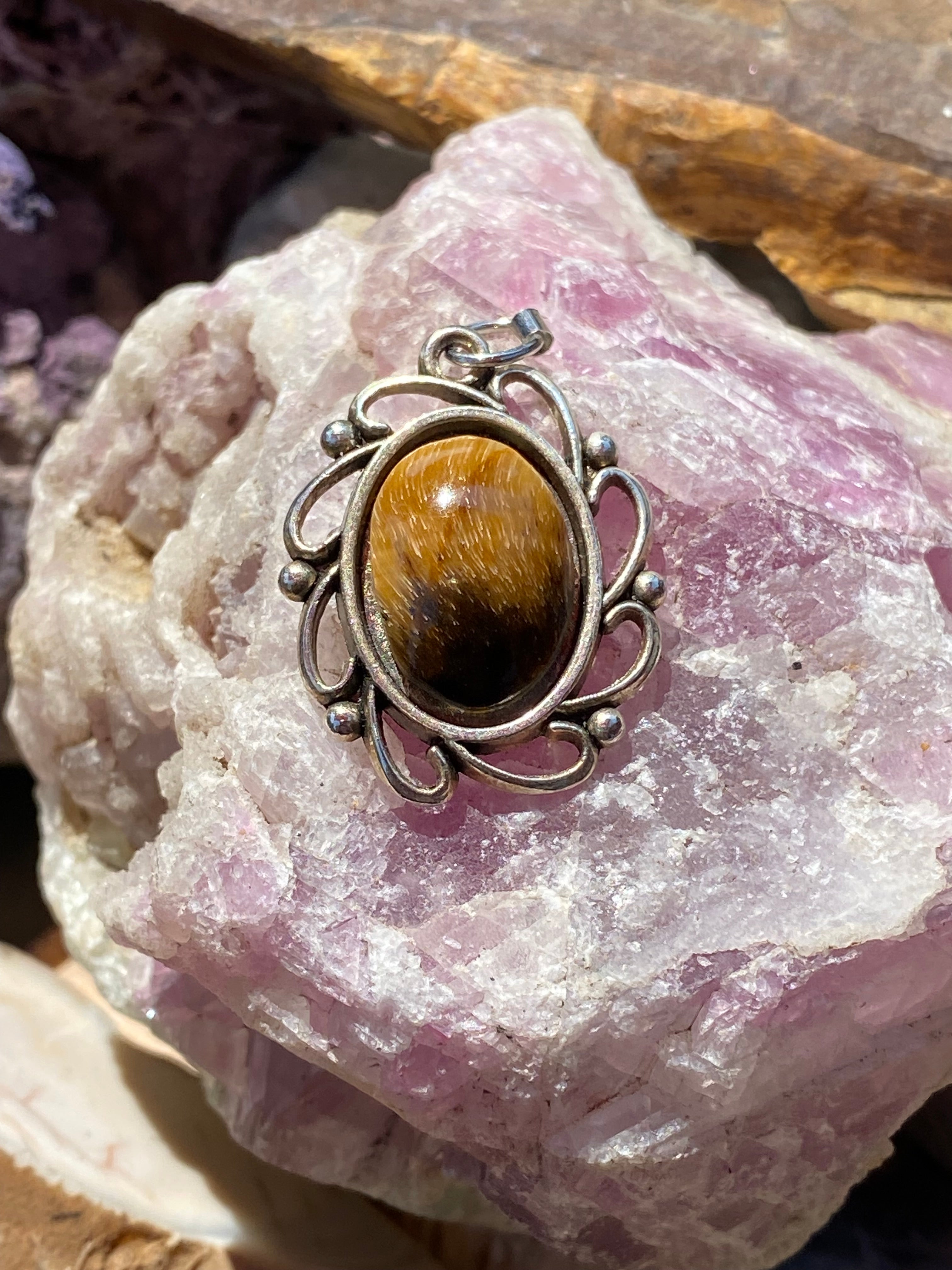 Natural Tiger Eye Pendant gemstone pendant, handcrafted jewelry featuring polished stone with unique color and mineral patterns