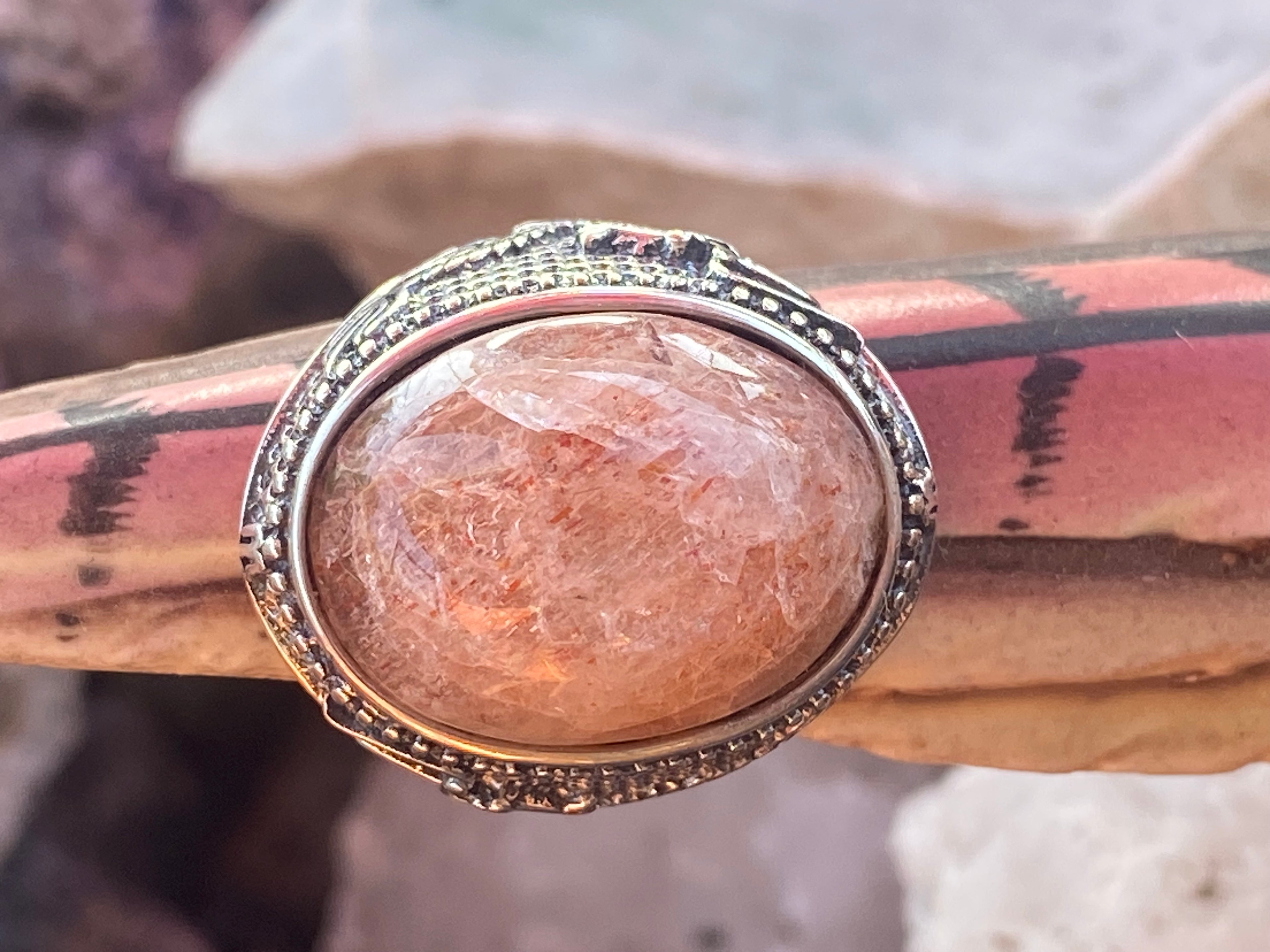 Natural Oregon Sunstone Ring with Intricate Dragon Motif in Sterling Silver gemstone ring, handcrafted jewelry featuring polished stone set in a decorative silver band