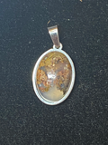 Natural Moss Agate gemstone jewelry featuring polished stone with distinctive color, pattern, and handcrafted craftsmanship