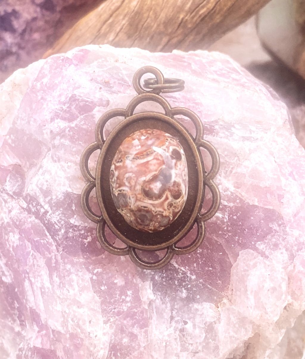 Natural Leopard Skin Jasper Pendant in Ornate Brass Frame gemstone pendant, handcrafted jewelry featuring polished stone with unique color and mineral patterns