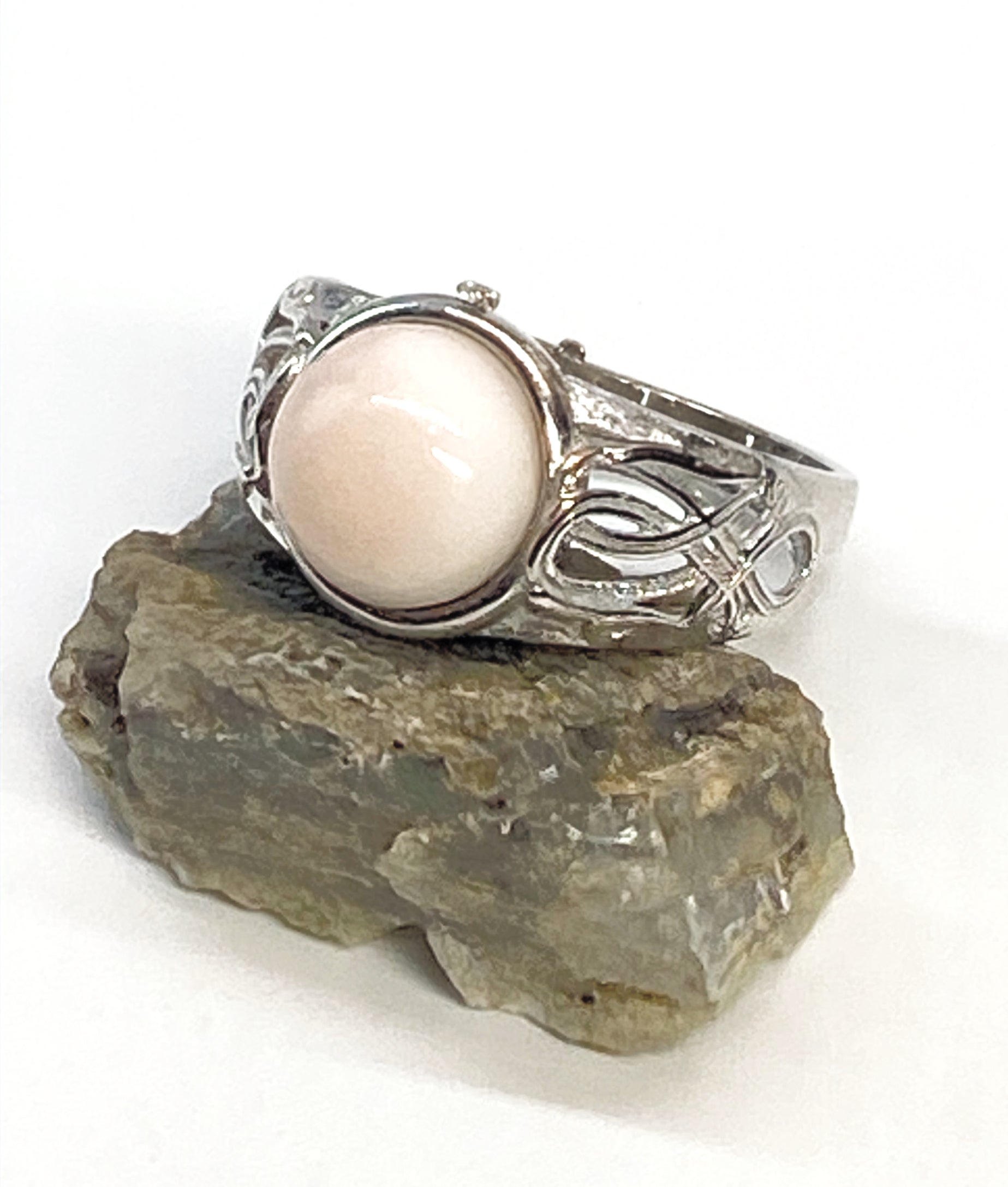 Natural Pink Manganese Ring on Silver-Plated Band gemstone ring, handcrafted jewelry featuring polished stone set in a decorative silver band
