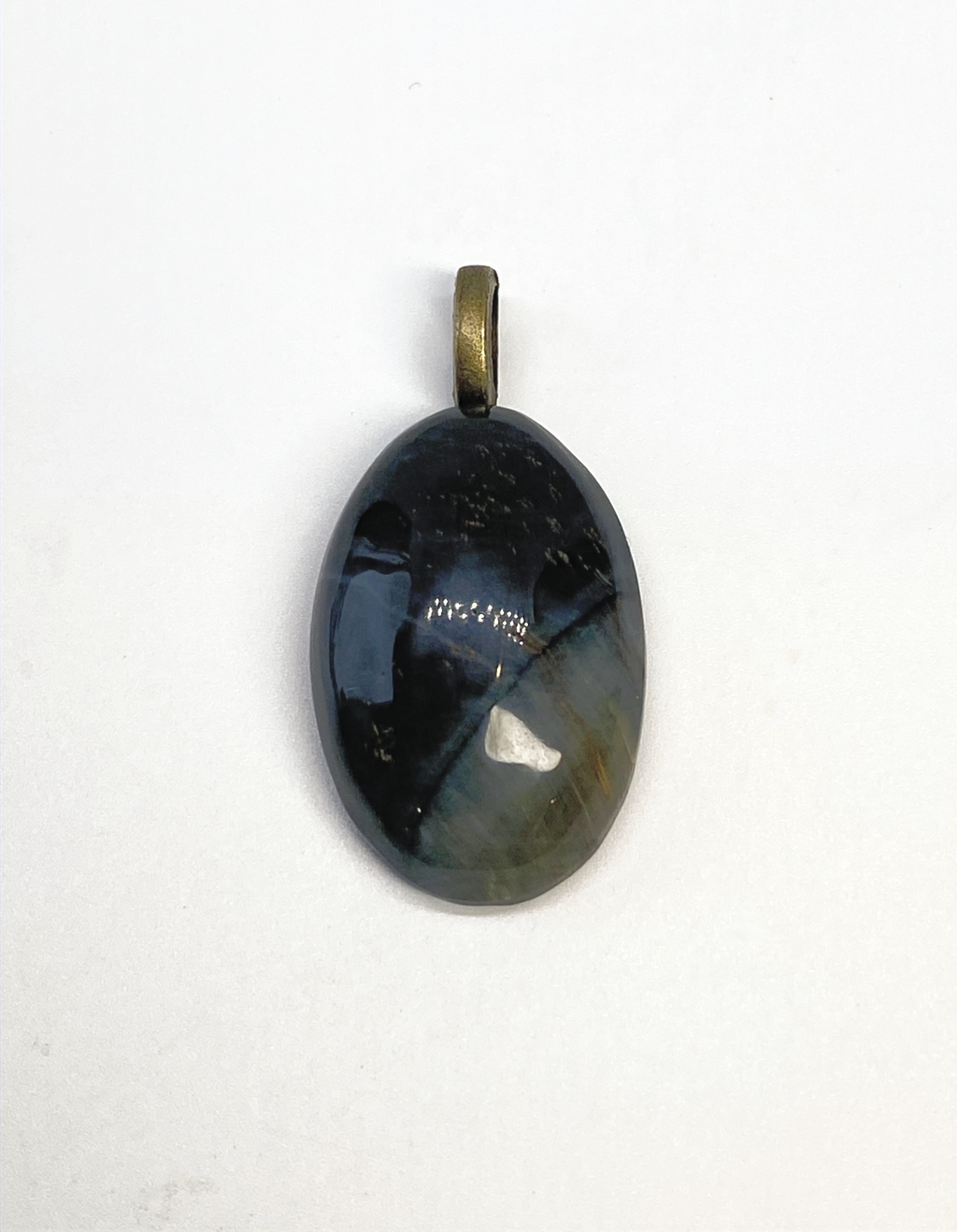 Natural Blue Tiger Eye  Pendent gemstone jewelry featuring polished stone with distinctive color, pattern, and handcrafted craftsmanship