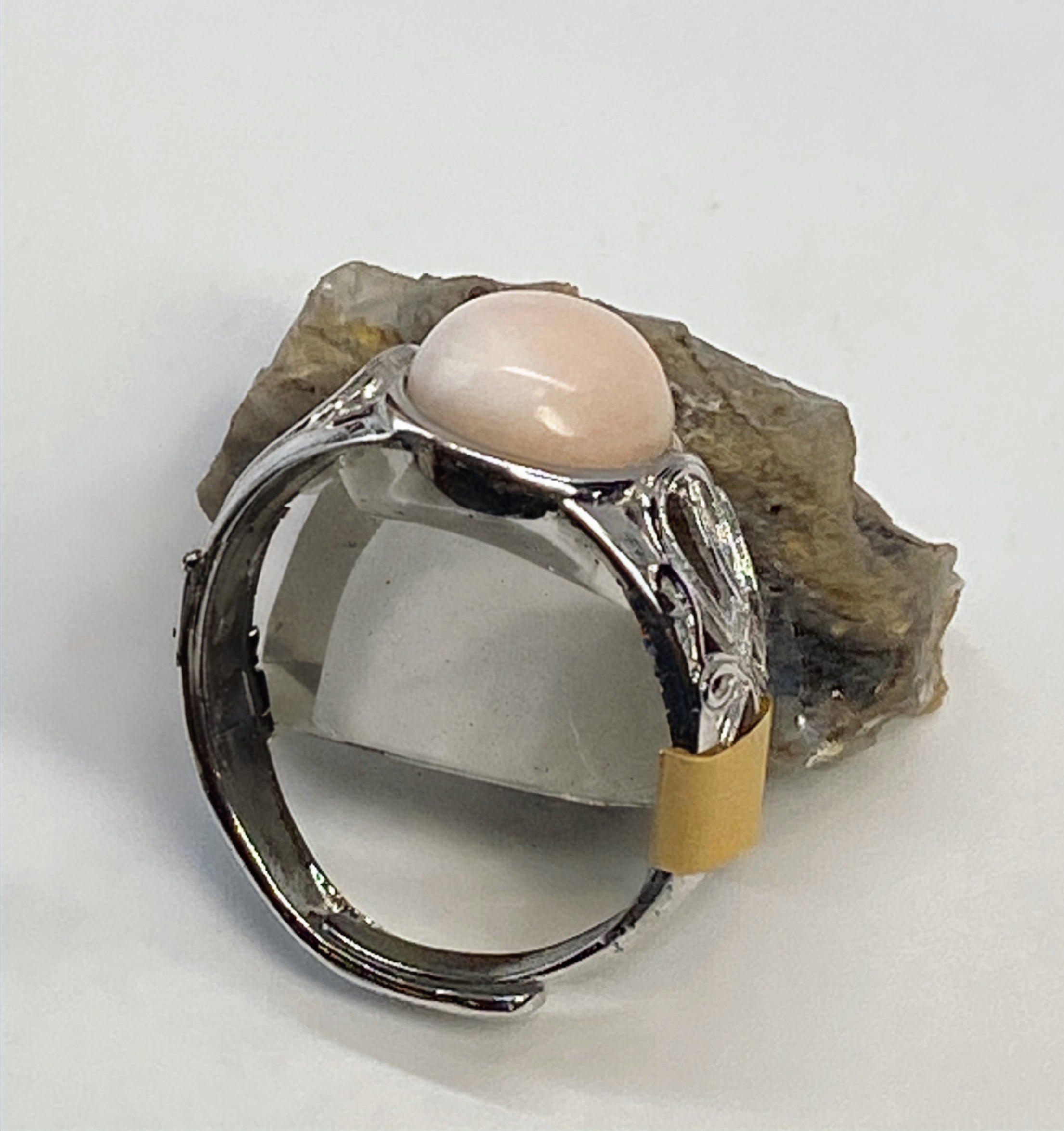 Natural Pink Manganese Ring on Silver-Plated Band gemstone ring, handcrafted jewelry featuring polished stone set in a decorative silver band