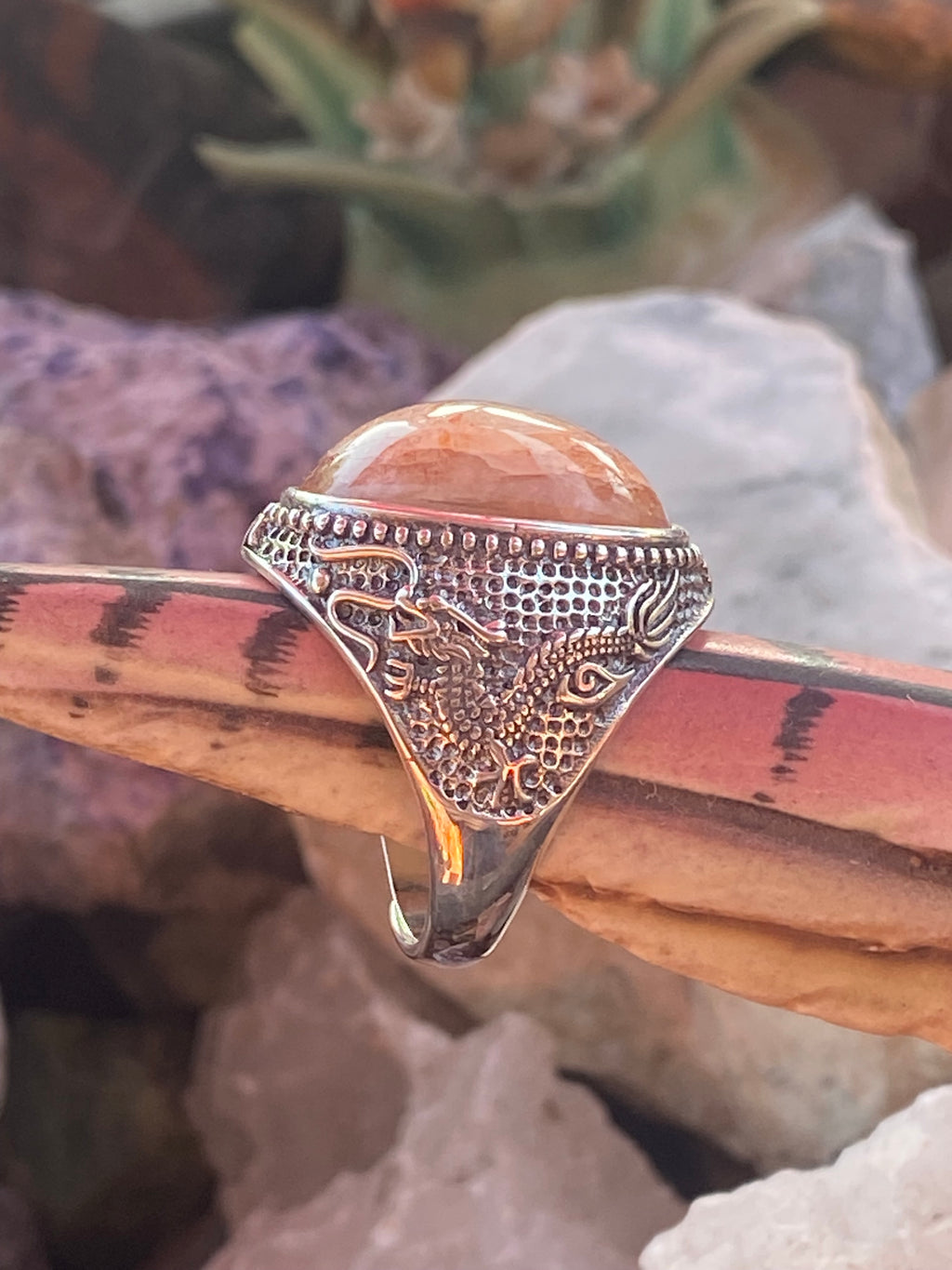 Natural Oregon Sunstone Ring with Intricate Dragon Motif in Sterling Silver gemstone ring, handcrafted jewelry featuring polished stone set in a decorative silver band