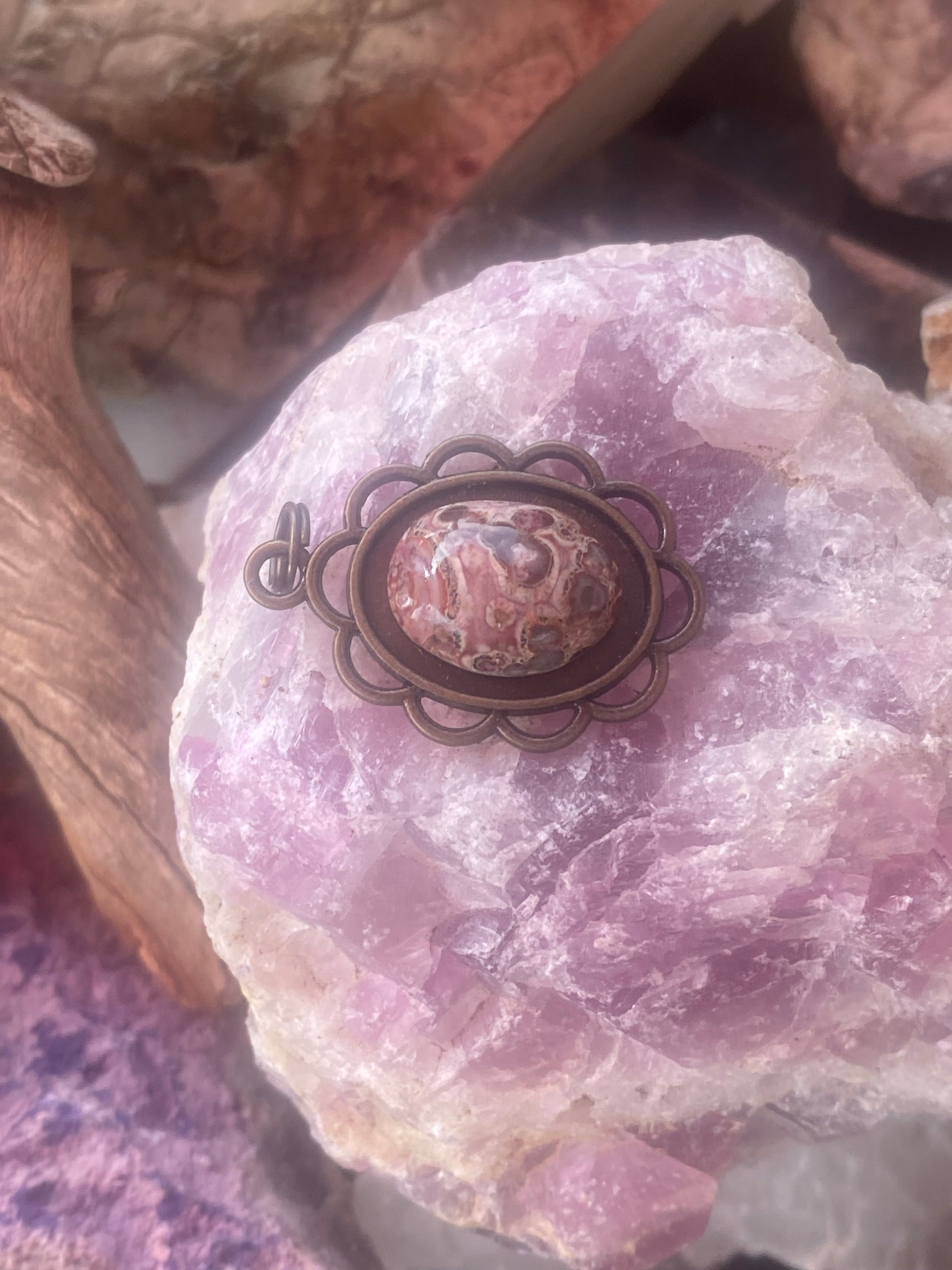Natural Leopard Skin Jasper Pendant in Ornate Brass Frame gemstone pendant, handcrafted jewelry featuring polished stone with unique color and mineral patterns