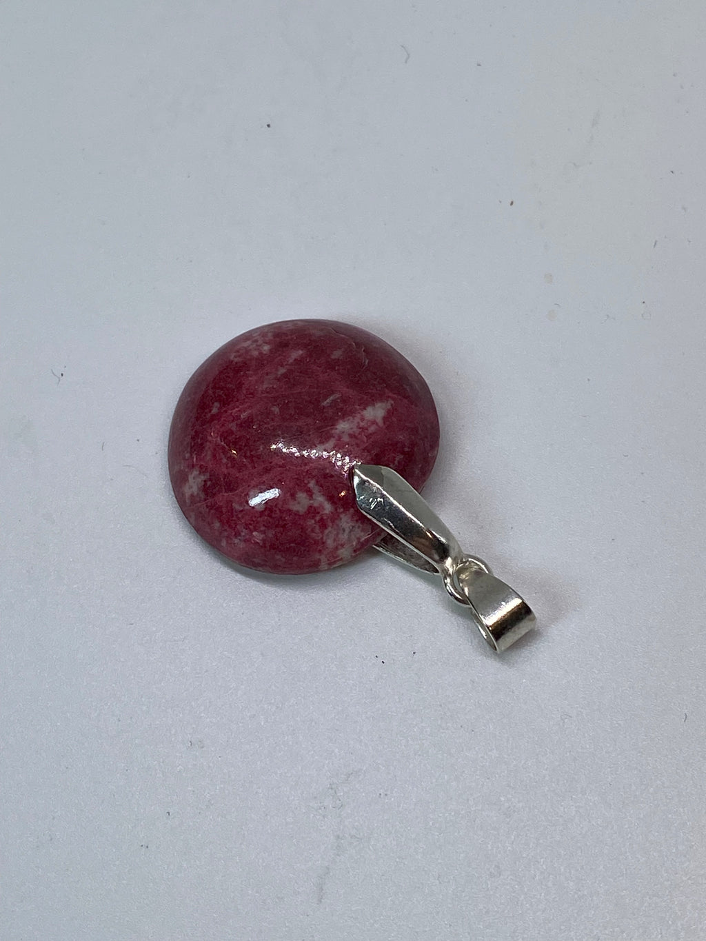 Natural Thulite Gemstone Pendant in Polished Steel gemstone pendant, handcrafted jewelry featuring polished stone with unique color and mineral patterns