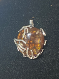 Natural Arizona Fire Agate Pendant Wrapped in Silver-Plated Metal gemstone pendant, handcrafted jewelry featuring polished stone with unique color and mineral patterns