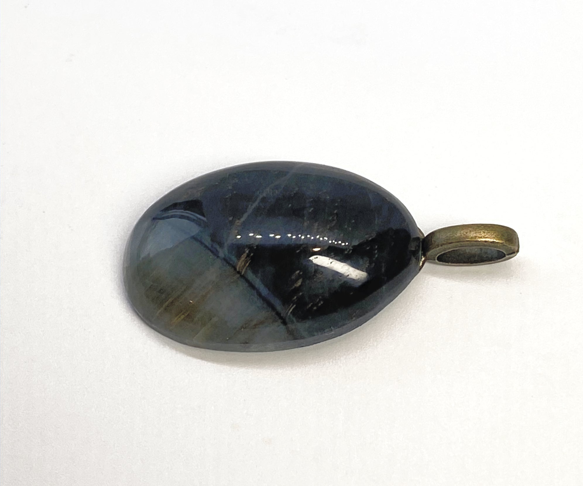 Natural Blue Tiger Eye  Pendent gemstone jewelry featuring polished stone with distinctive color, pattern, and handcrafted craftsmanship