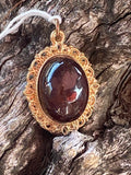 Natural Garnet Rhodolite Pendant gemstone pendant, handcrafted jewelry featuring polished stone with unique color and mineral patterns