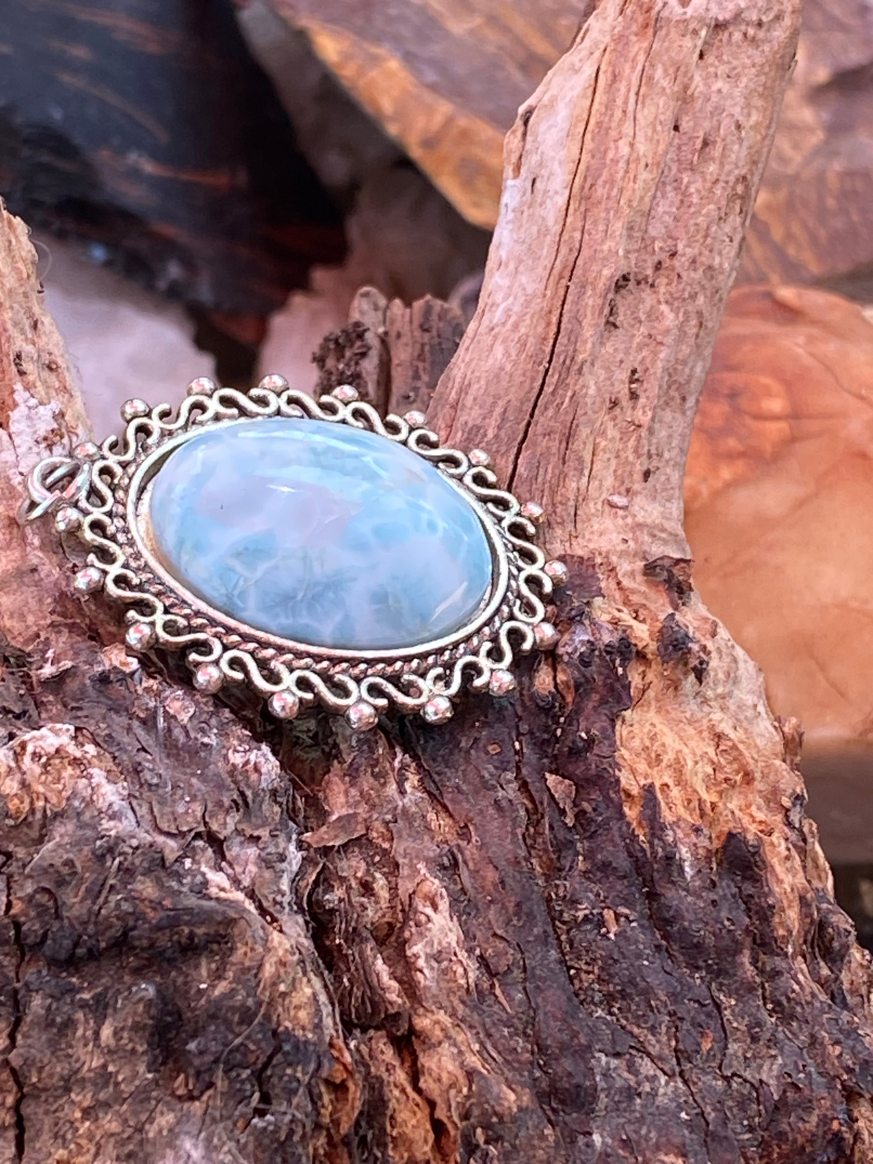 Natural Elegant Larimar Pendant on Silver-Plated pendant gemstone pendant, handcrafted jewelry featuring polished stone with unique color and mineral patterns