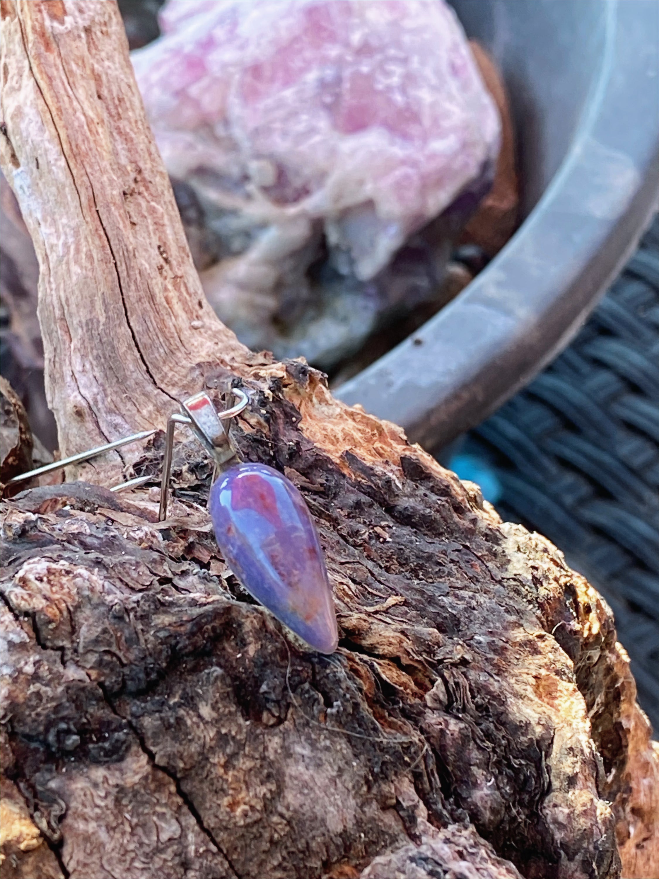 Natural Purple Agate Pendent gemstone jewelry featuring polished stone with distinctive color, pattern, and handcrafted craftsmanship