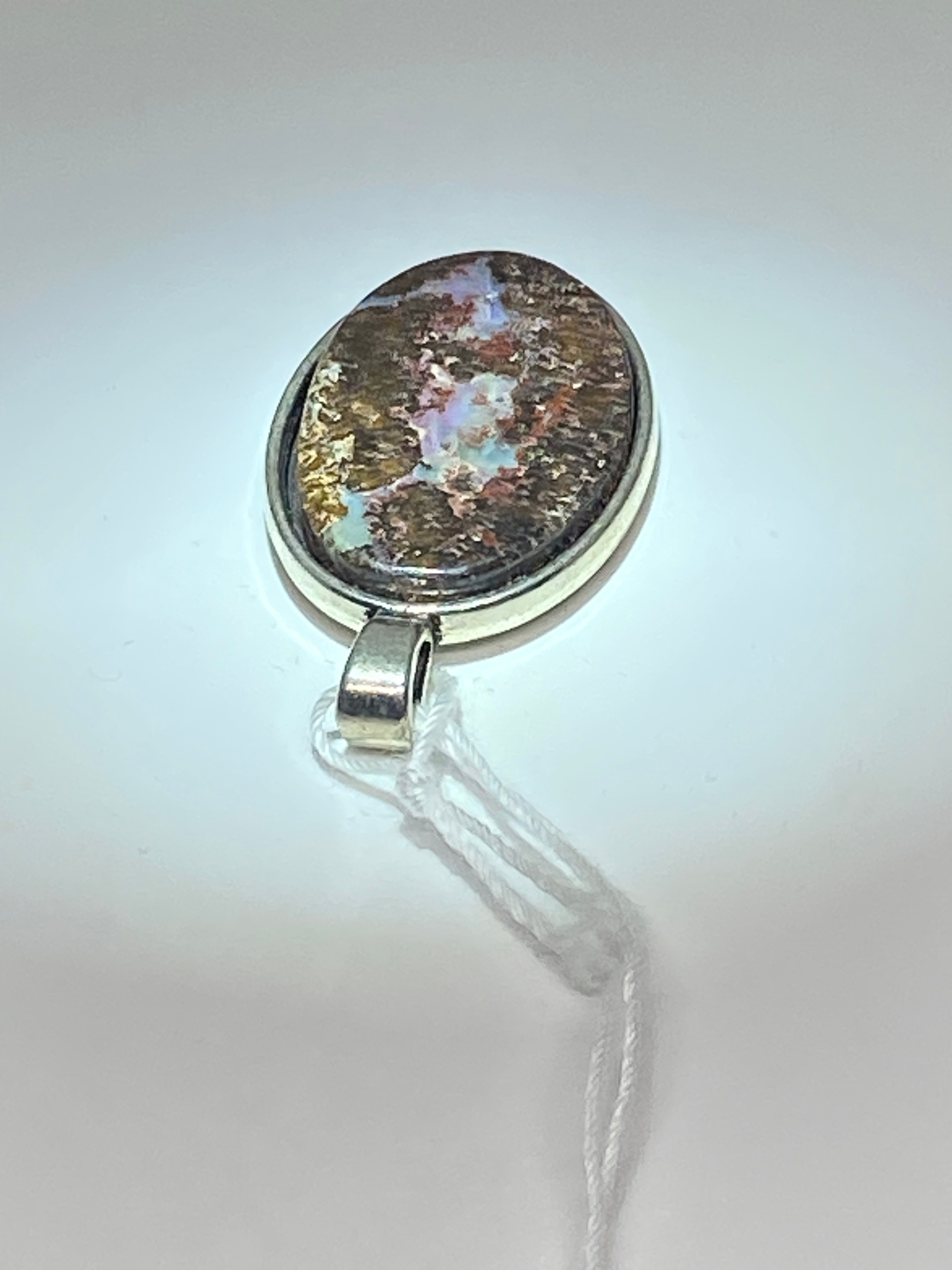 Natural Australian Boulder Opal Pendant gemstone pendant, handcrafted jewelry featuring polished stone with unique color and mineral patterns