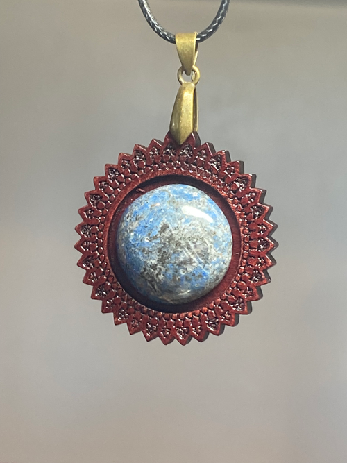 Natural Artisan Lapis Lazuli Pendant with Intricate Wooden Frame showcasing unique gemstone color and pattern in a handcrafted pendant