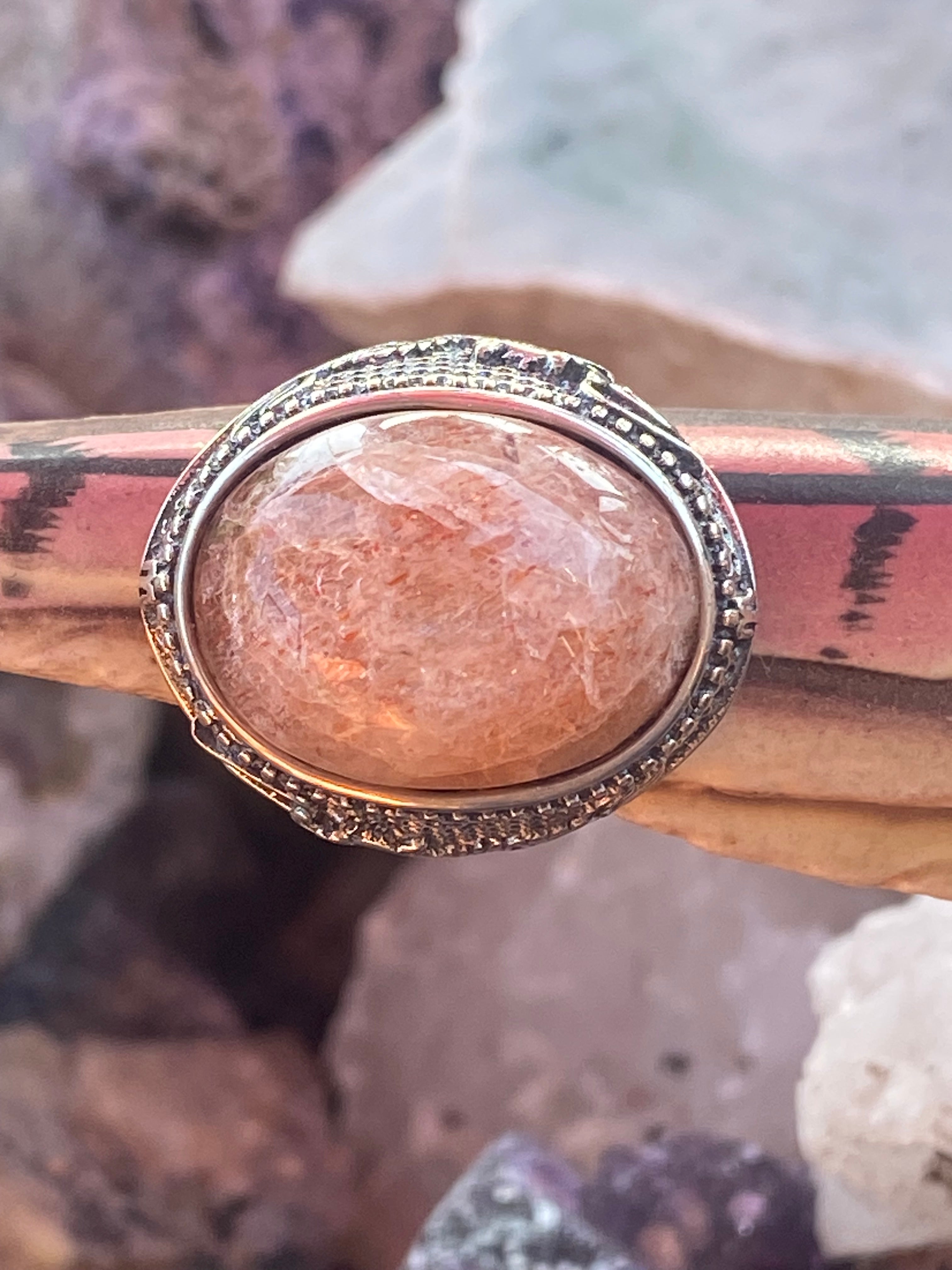 Natural Oregon Sunstone Ring with Intricate Dragon Motif in Sterling Silver gemstone ring, handcrafted jewelry featuring polished stone set in a decorative silver band