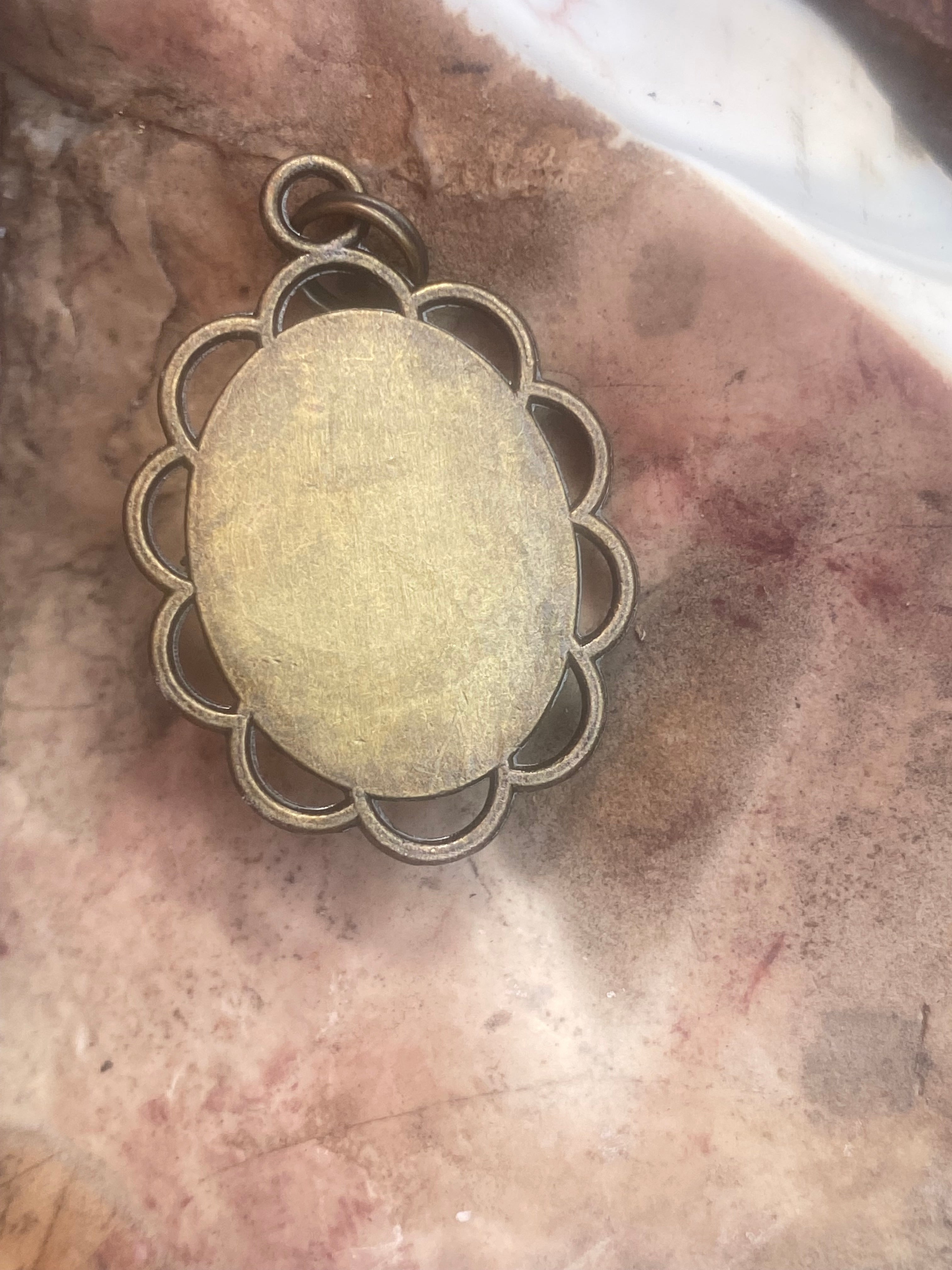 Natural Leopard Skin Jasper Pendant in Ornate Brass Frame gemstone pendant, handcrafted jewelry featuring polished stone with unique color and mineral patterns