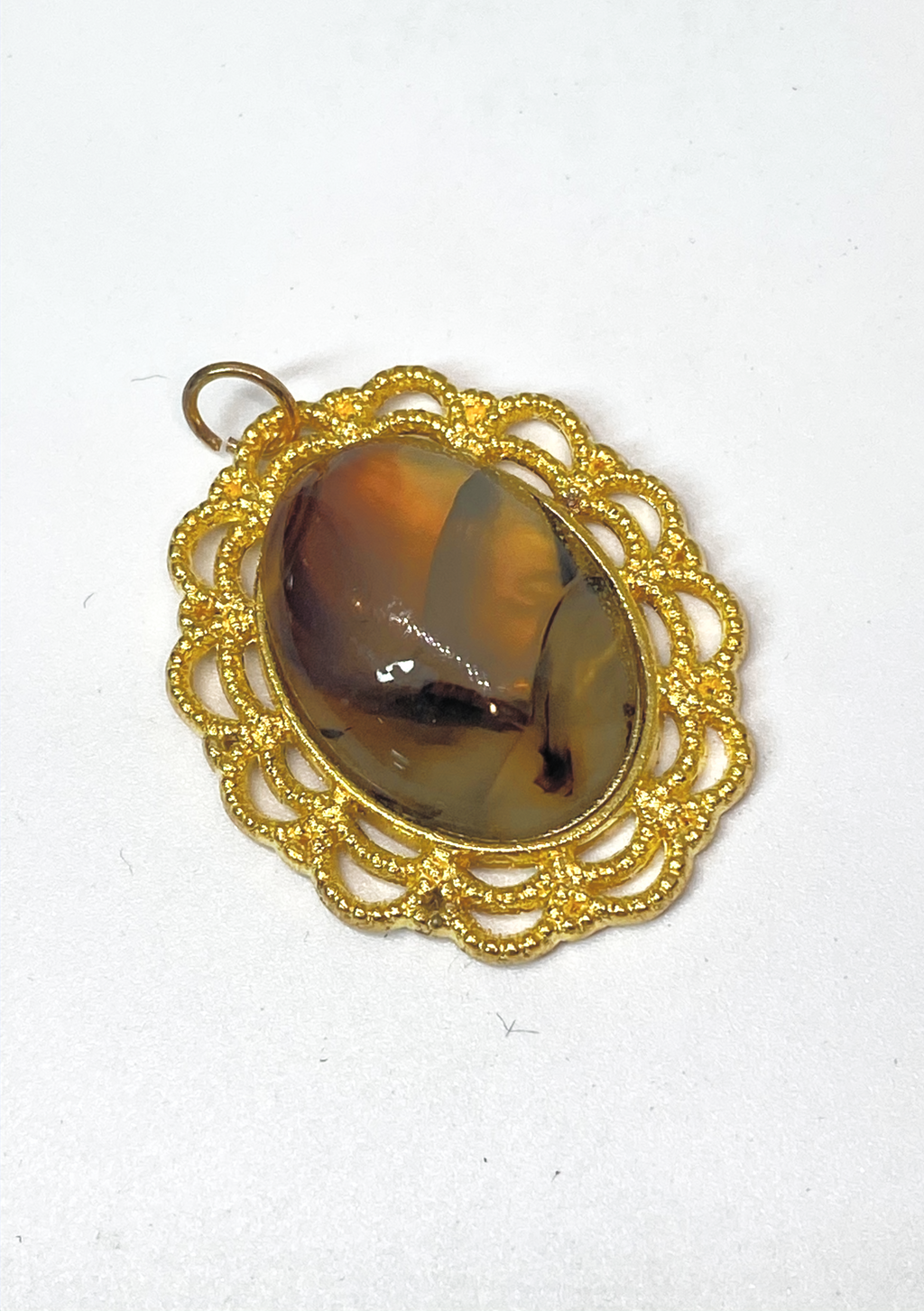 Natural Montana Agate Pendant in Gold-Plated Frame gemstone pendant, handcrafted jewelry featuring polished stone with unique color and mineral patterns