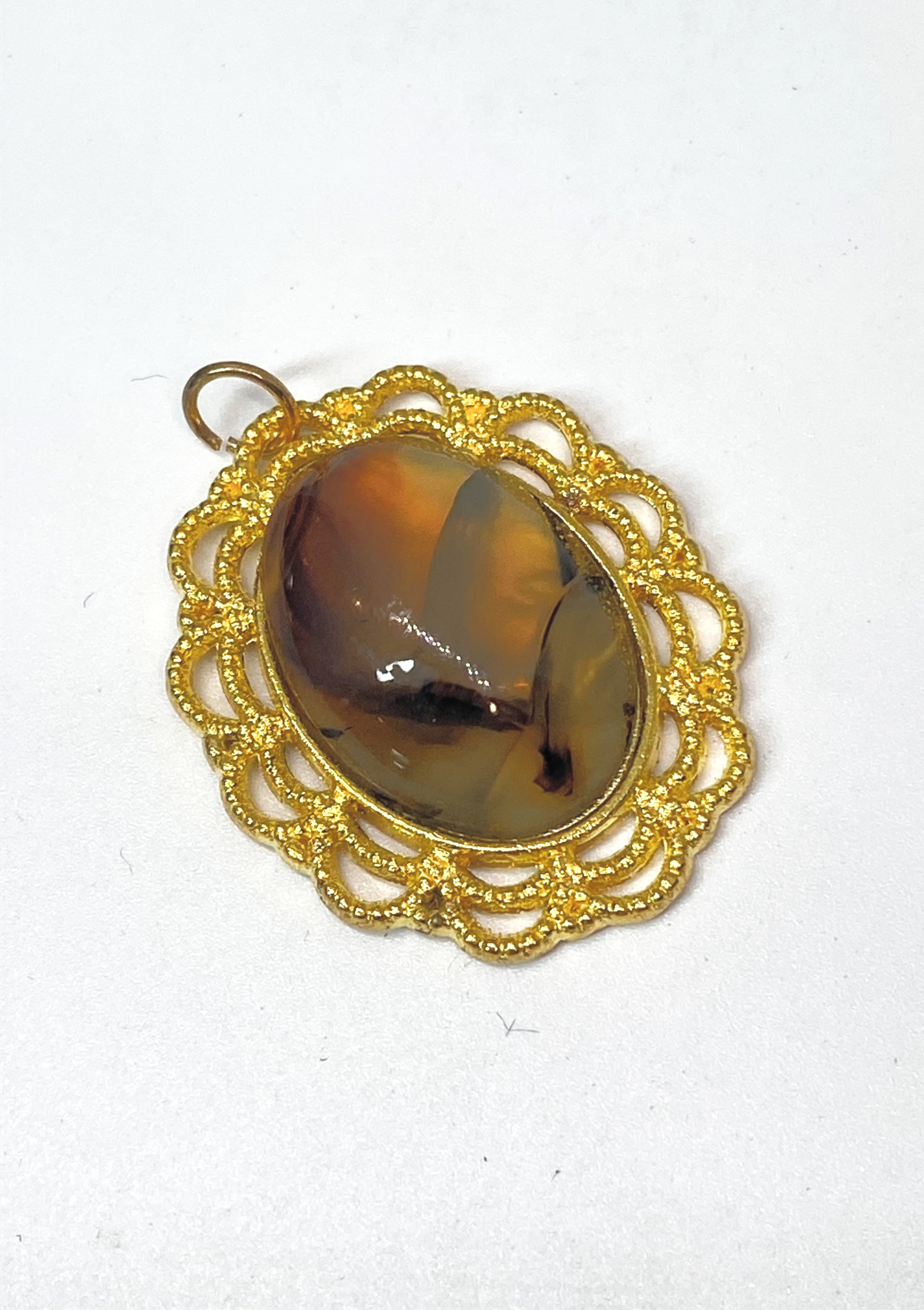 Natural Montana Agate Pendant in Gold-Plated Frame gemstone pendant, handcrafted jewelry featuring polished stone with unique color and mineral patterns